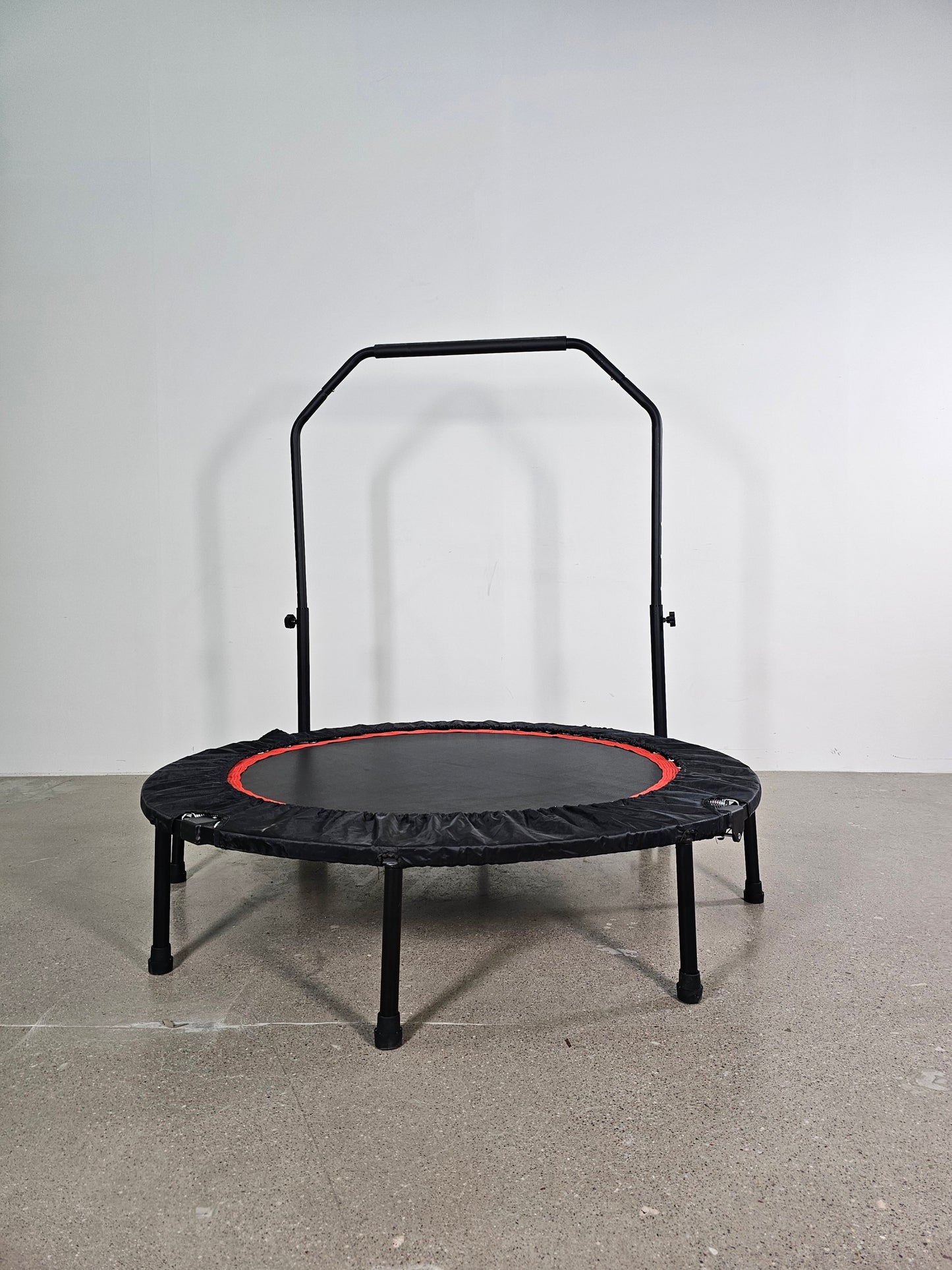 BounceFit Mini Trampoline with Adjustable Handle